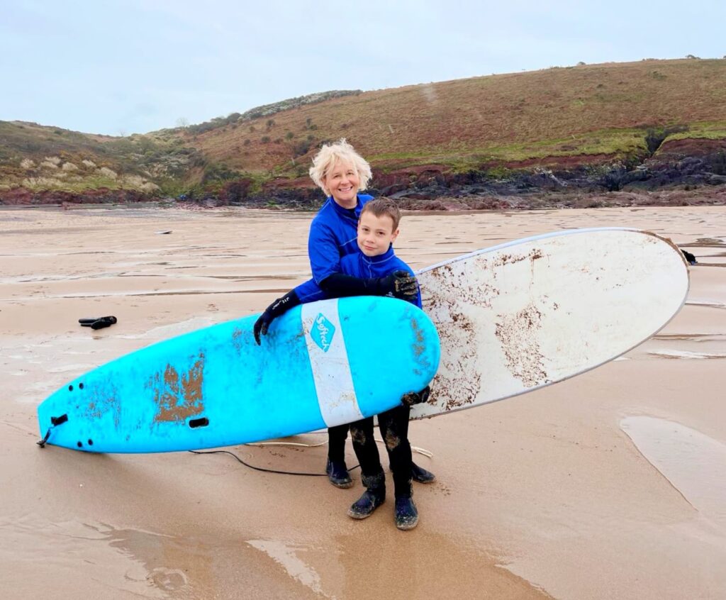 Enjoying surfing in Wales with my eldest (he was better than me)!